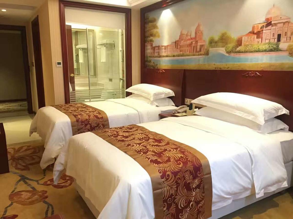 Vienna Hotel Zhongshan Guzhen Town Center מראה חיצוני תמונה
